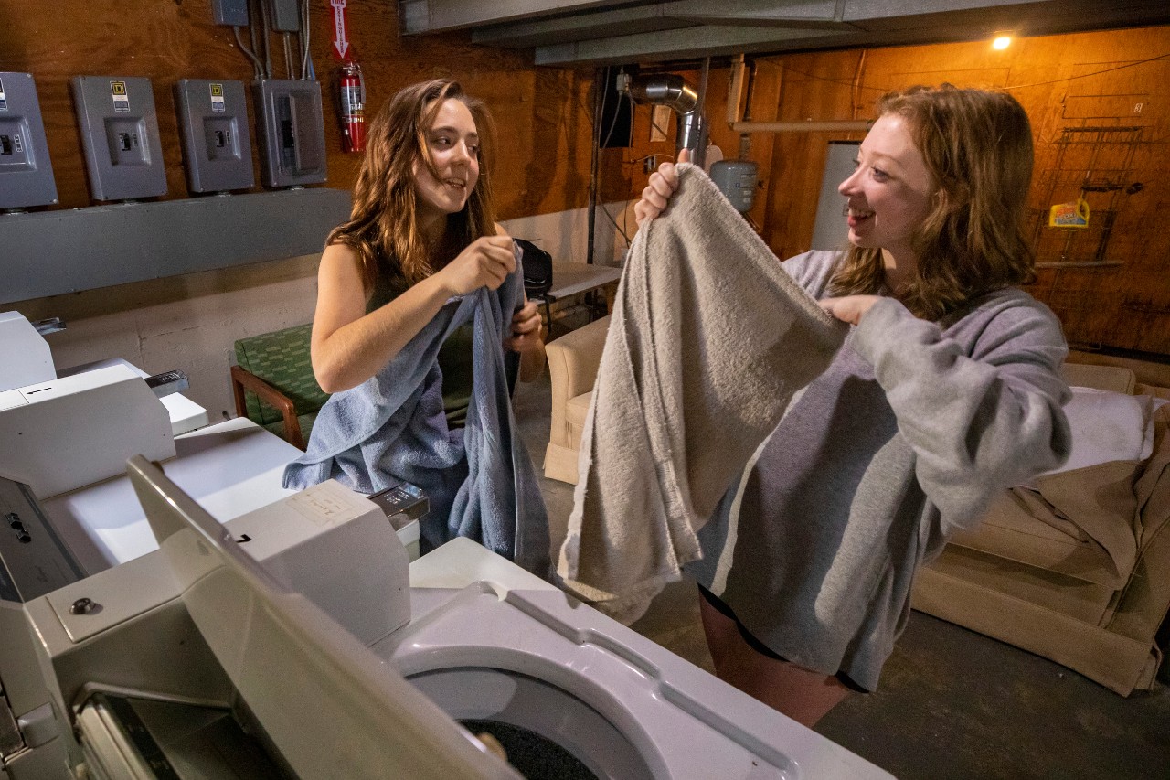 Gap year students from left 
Esther Cox
Dani Markham do laundry 
