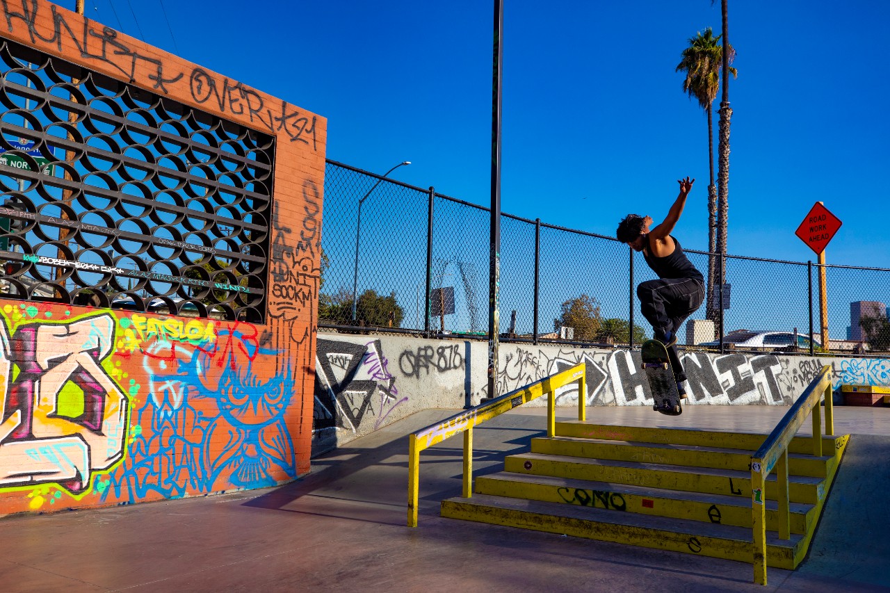 boy does skateboard trick