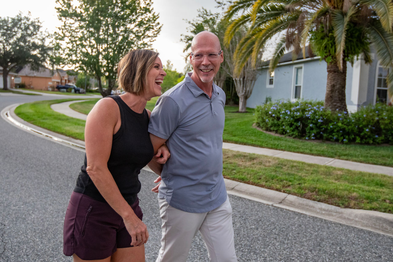 Lisa and Dennis, her husband, walk around the neighborhood