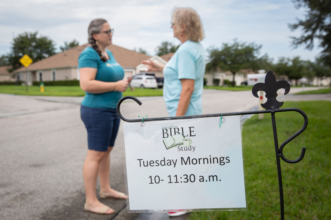 Molody's mom, Kathy Secrest, and Melody lead a Bible study with several neighborhood ladies. 