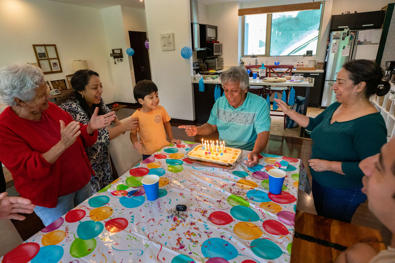 Cristobal celebrates his 62nd birthday with (starting from left) his mother, daughter, grandson, wife and son.