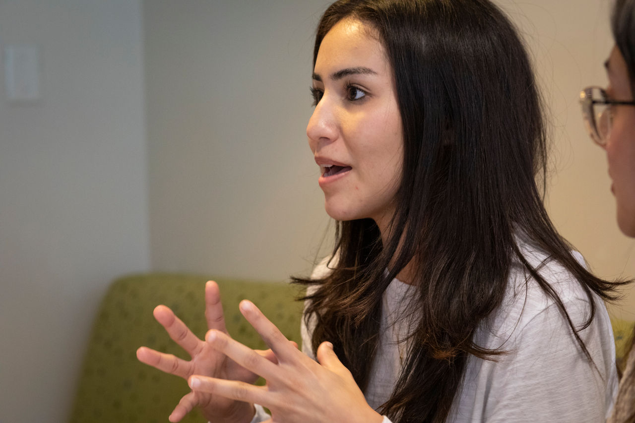 University of South Florida Cru ministry, Jeanessa Soto making some comments during Lia's Bible study. 