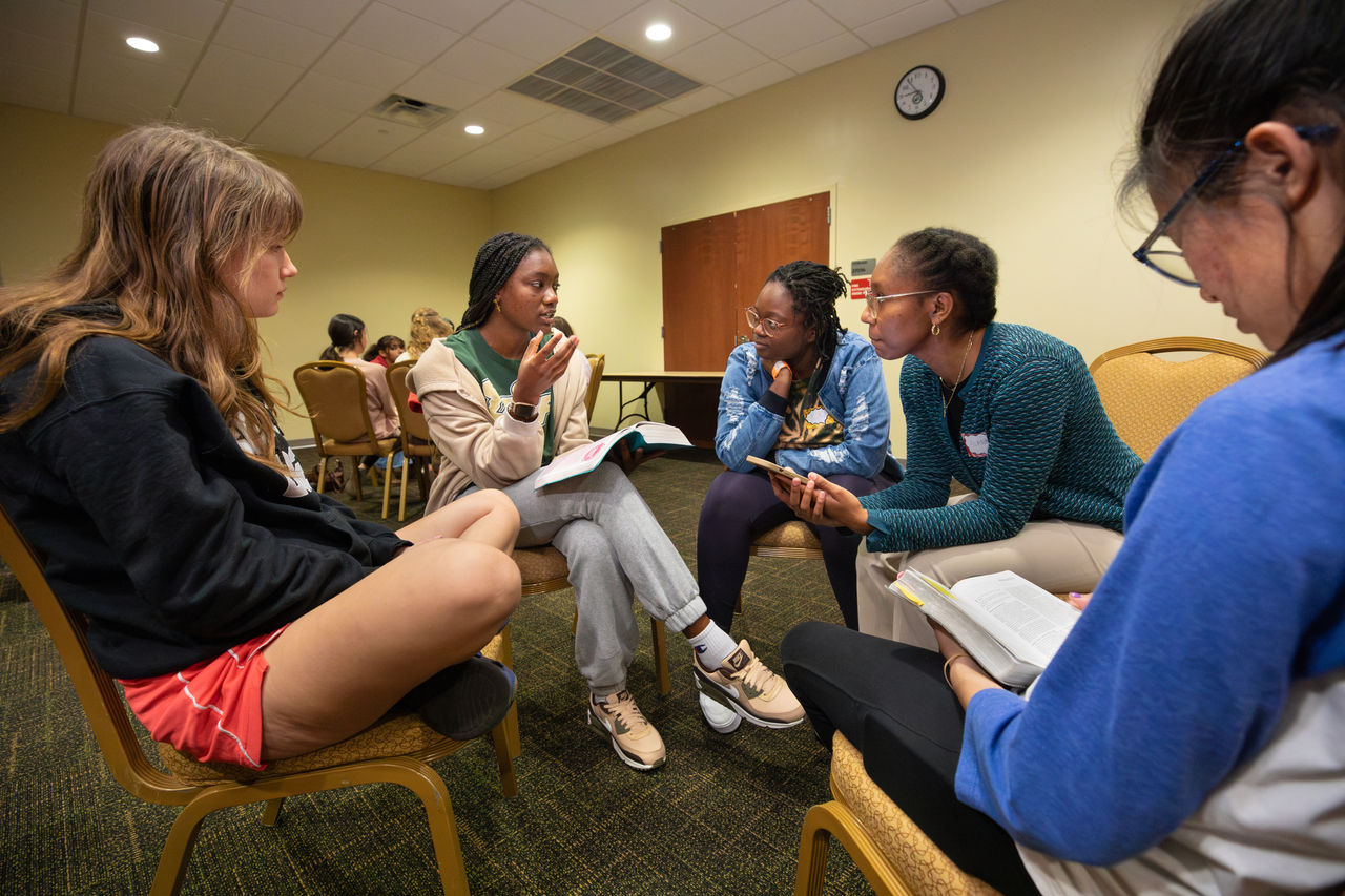 At the Cru weekly meeting, they break up into small Bible Studies for most of the time. University of South Florida Cru ministry