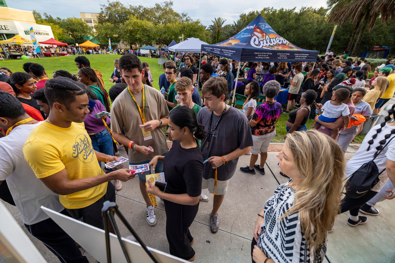 Cru-lead USF welcome outreach event with survey follow up with local volunteers