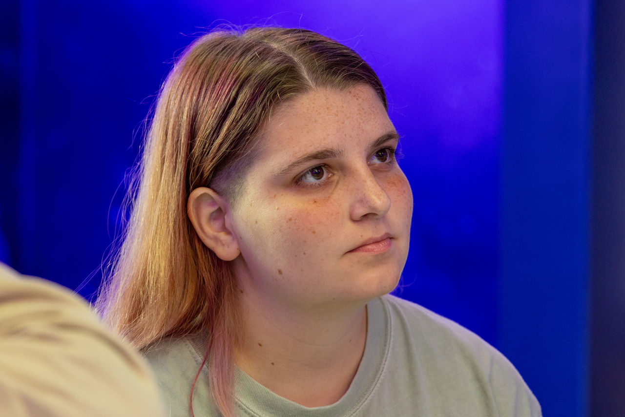 Rose listens intently