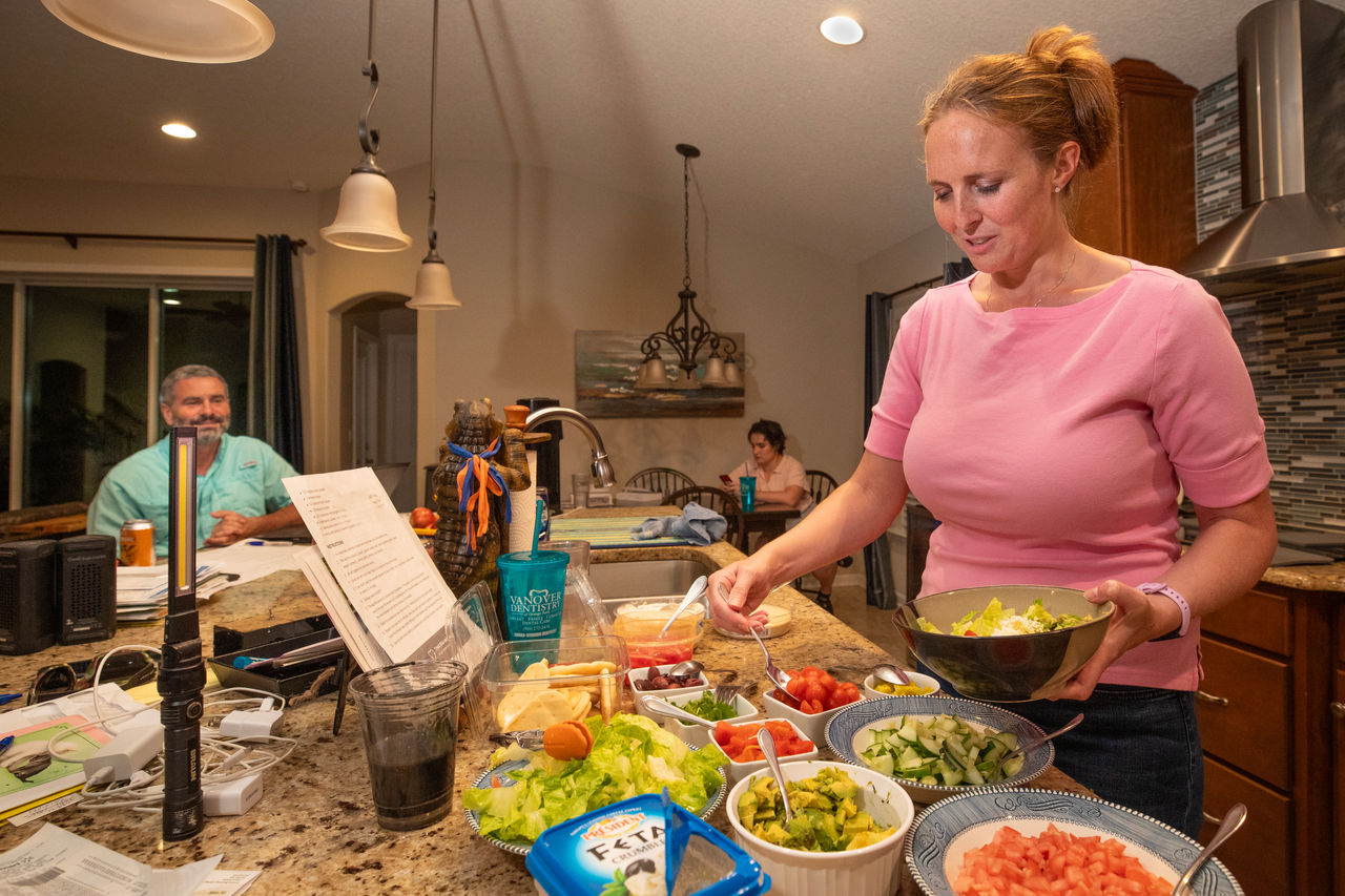 Jennifer Vanover, attorney with FLAG ministry. Jen who enjoys cooking working in her kitchen, preparing dinner after getting home from the beach. 
