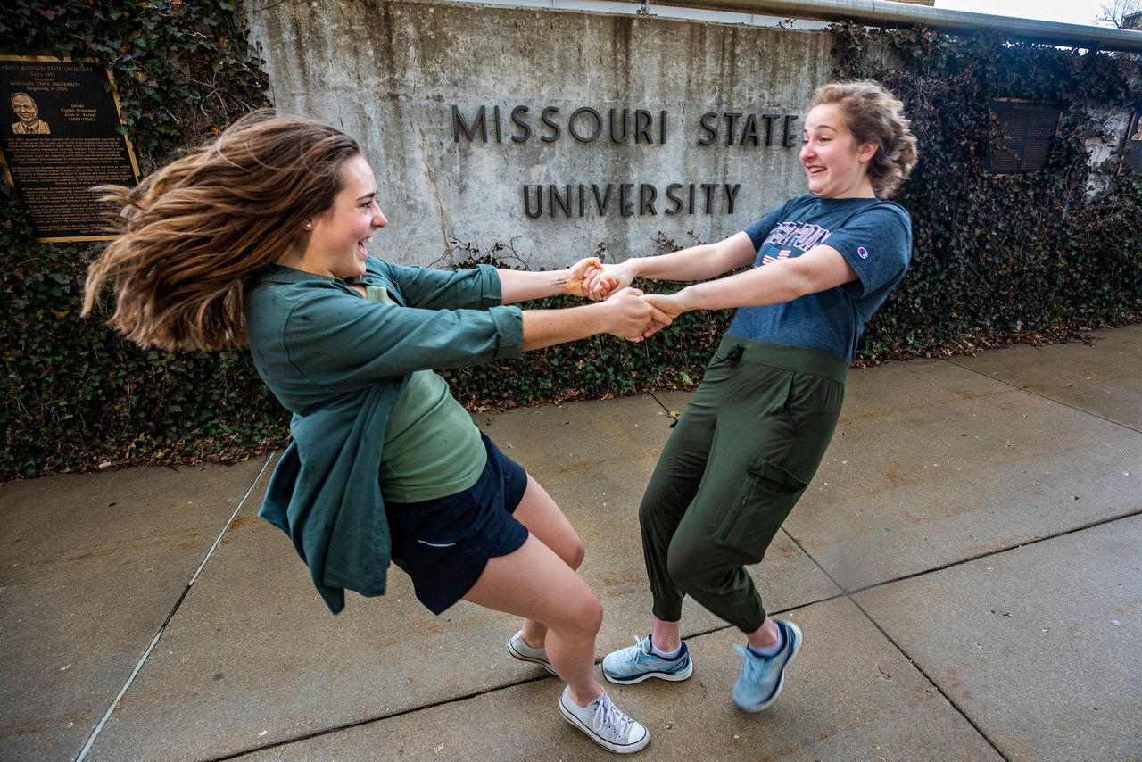 Gap Year students Esther Cox (R) dances with Hannah Sowatzke